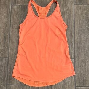 Danskin Now Women's Orange Racerback Tank Top, size small. Scoop hem, Dri more